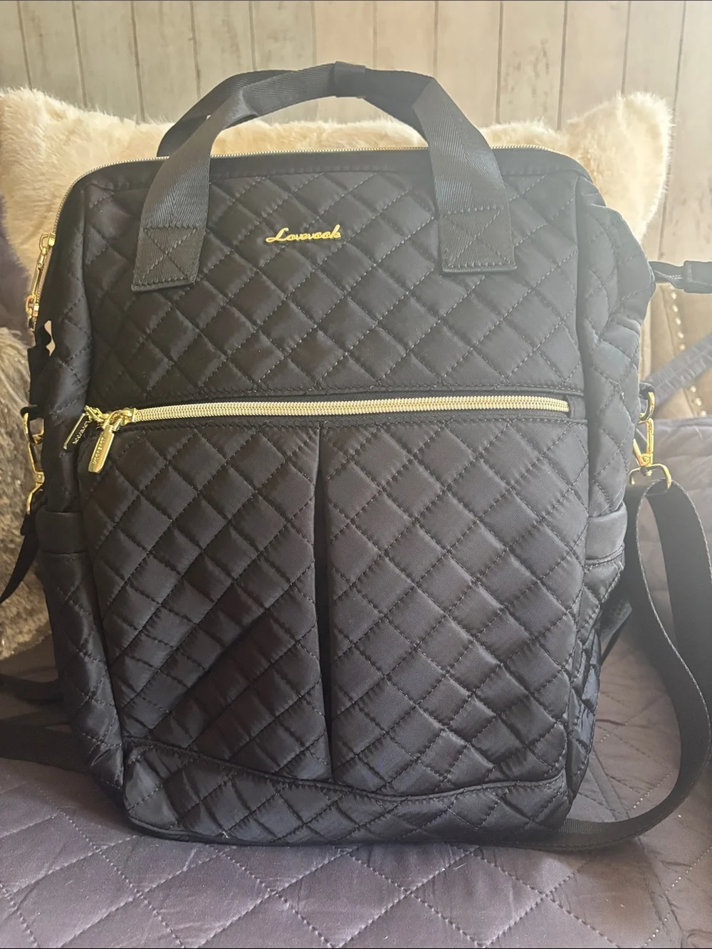 Stylish Quilted Black Backpack with Gold Hardware